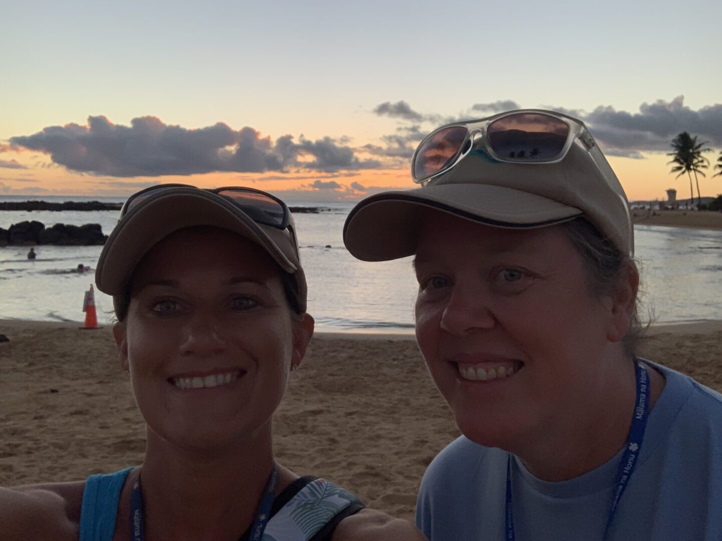 Selfie of two women looking at camera at beach